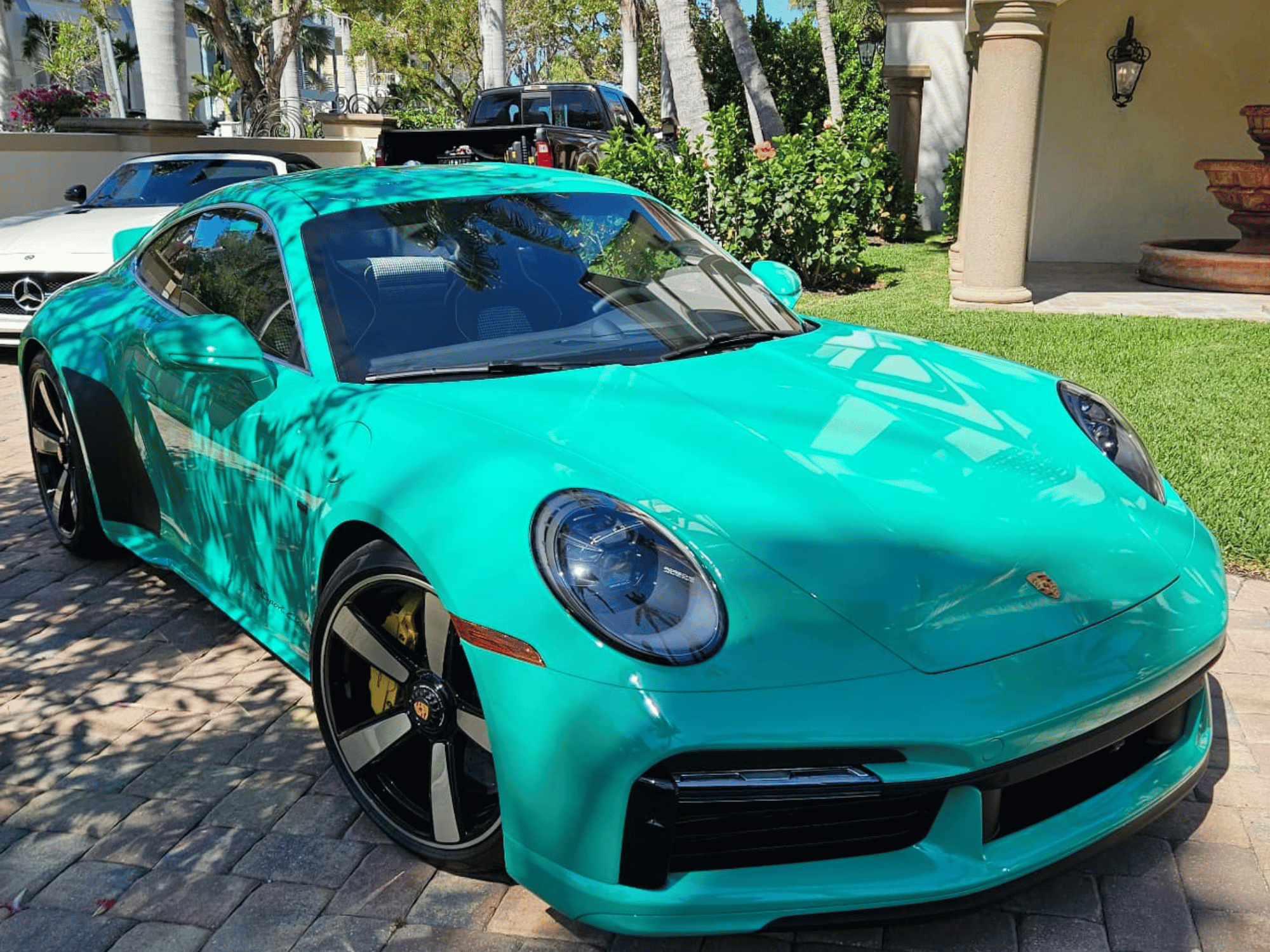 Turquoise Porsche 911 exterior detailing service in Naples Florida