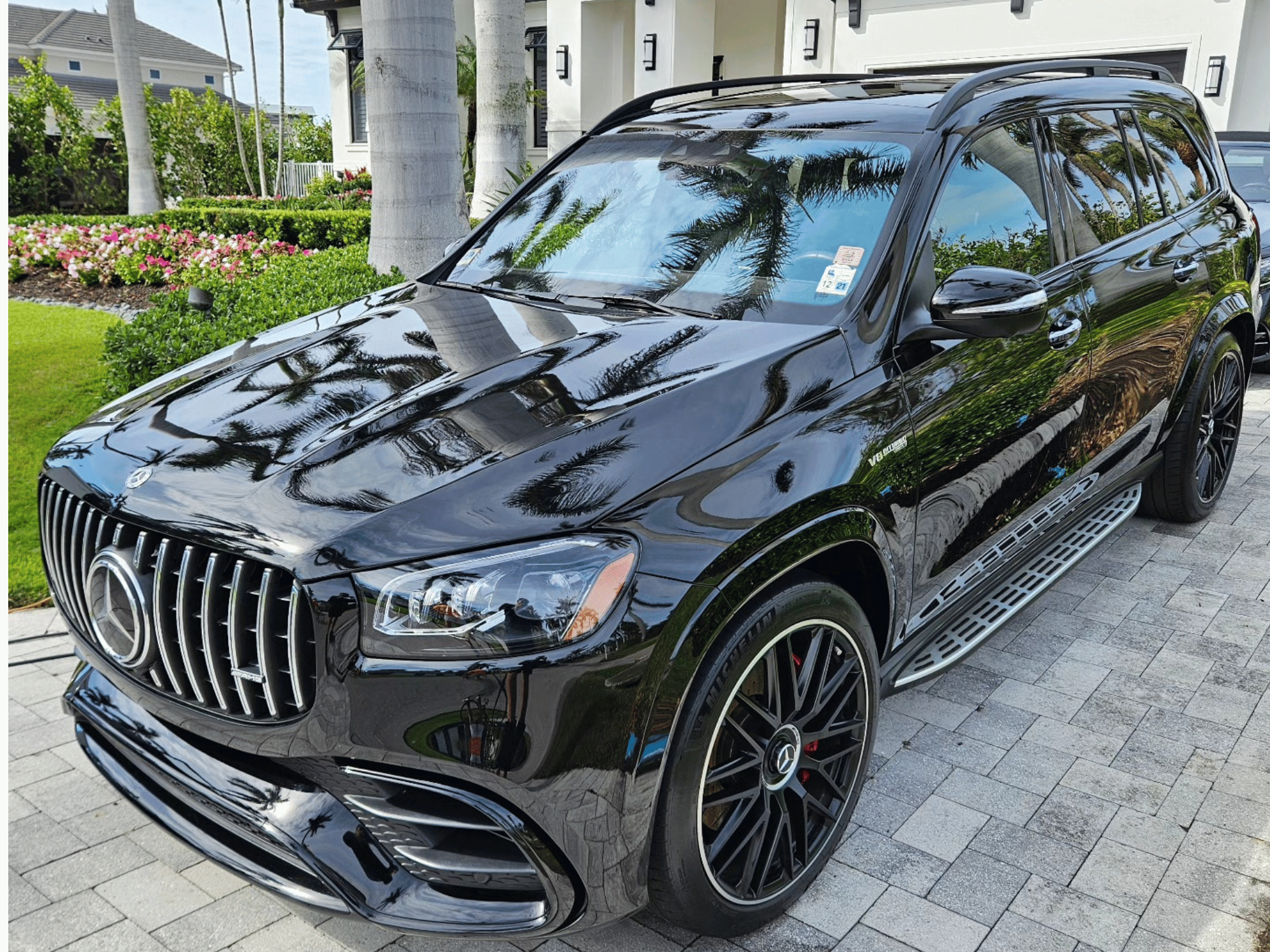 Black Mercedes AMG SUV full detail with high gloss finish in Naples Florida