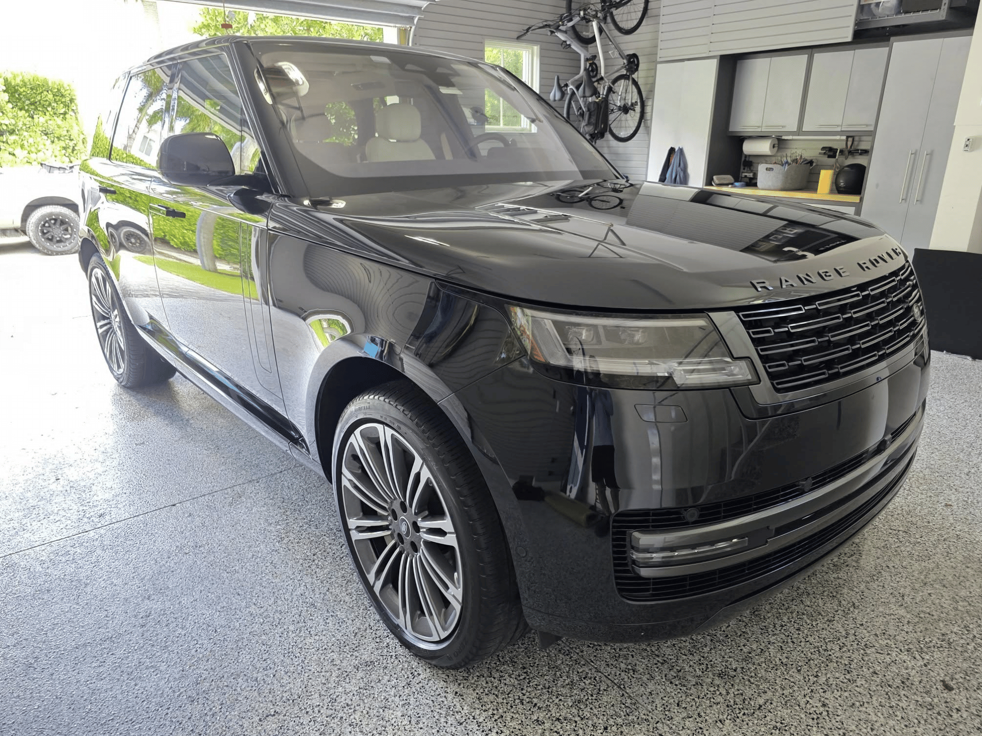 Range Rover detailing service with paint finish enhancement in Naples Florida